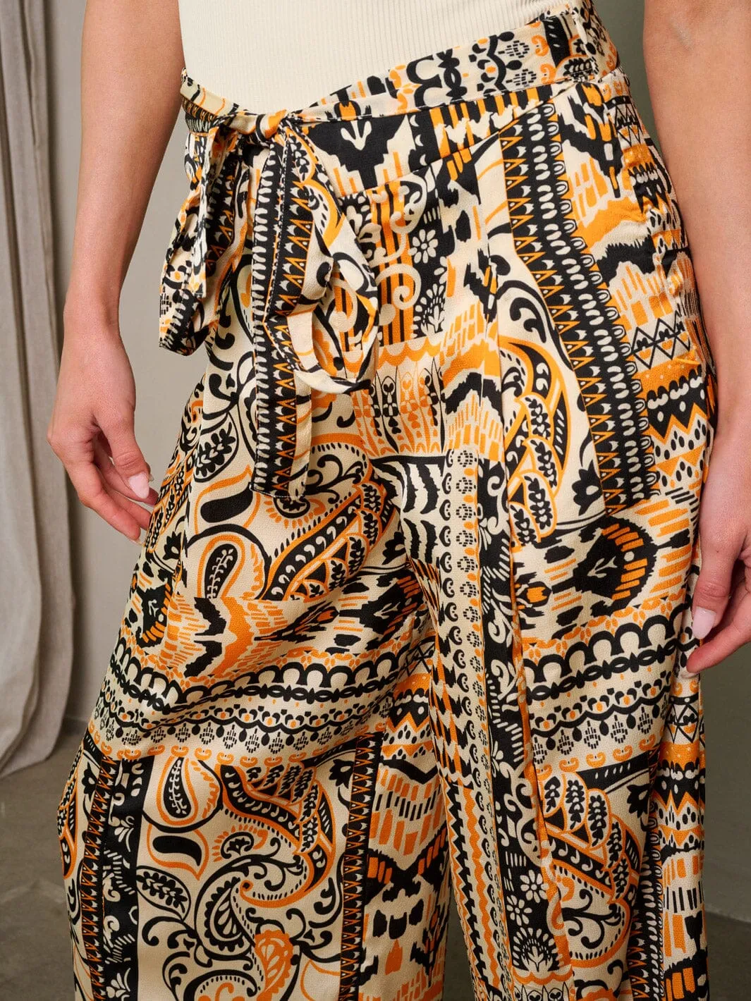 WOMEN'S ZIP UP SELF TIE PALAZZO MULTI PRINT PANTS